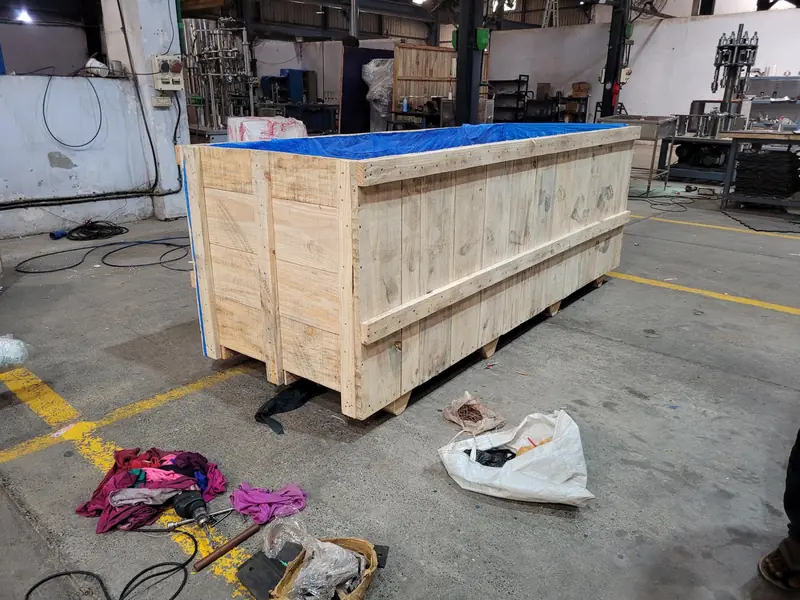 Wooden box lined with blue VCI sheet for export packing